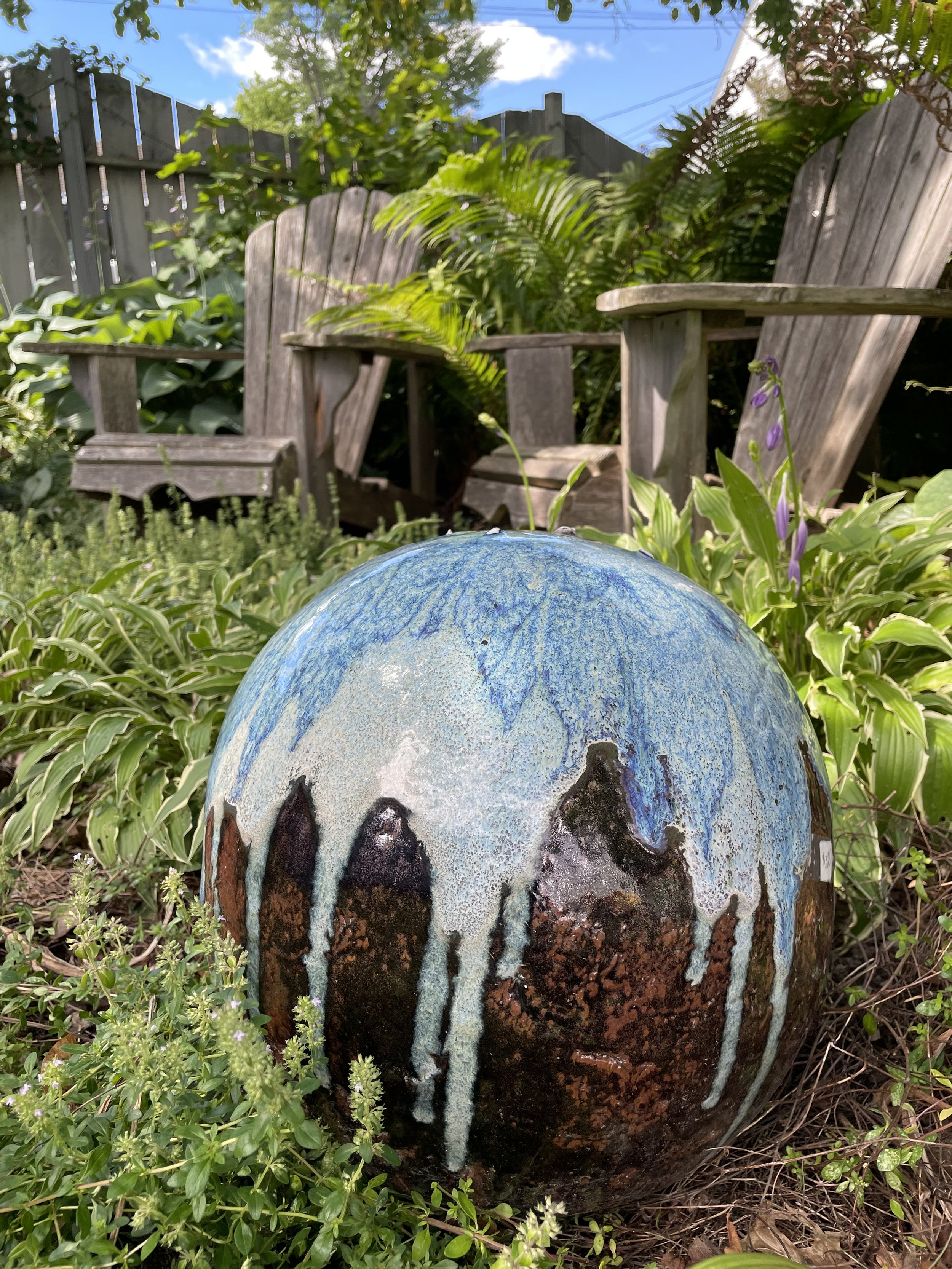 Ceramic sphere in the garden.