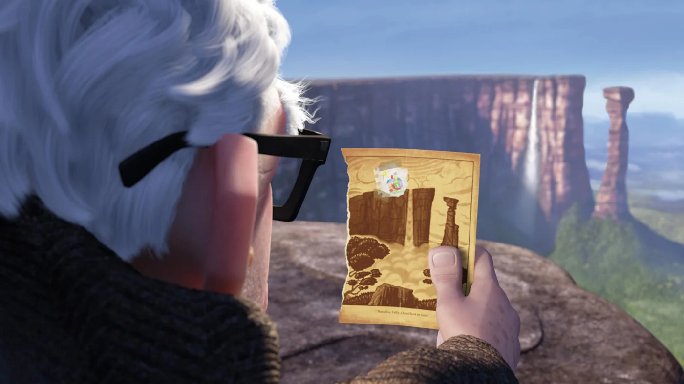 Carl holding up the finished Tepui etching in front of the Paradise Falls location.