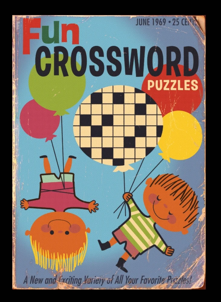 Physical prop cover of used vintage crossword puzzle book.