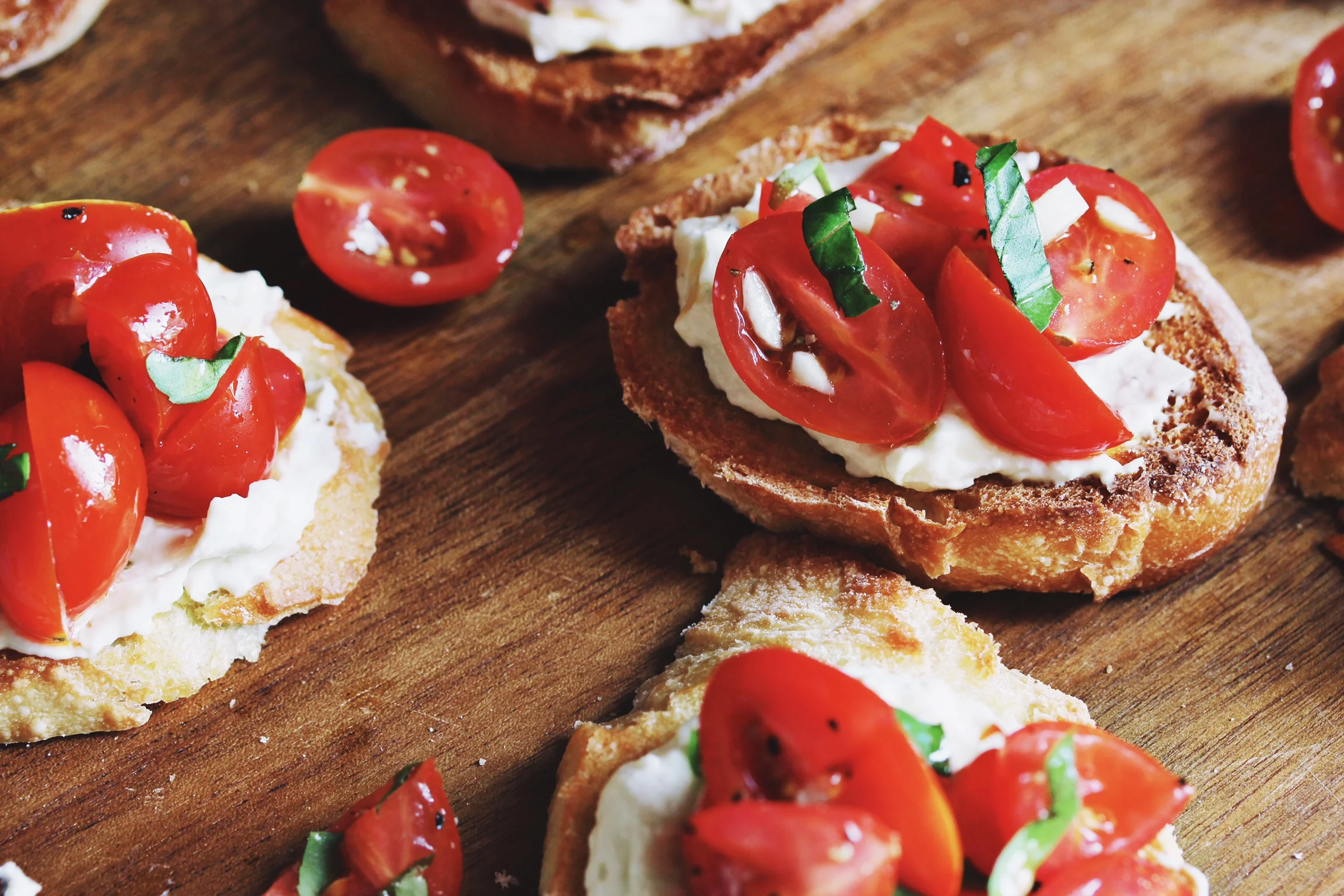 Cherry tomato and creamed feta crostini