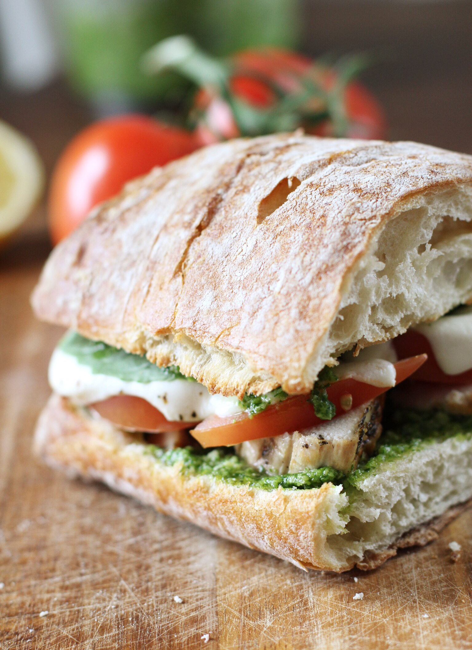 Chicken, tomato, and mozz melt with basil-arugula pesto - The Pastiche