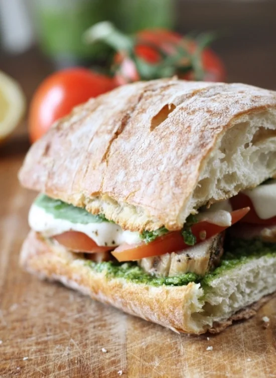 Chicken, tomato, and mozz melt with basil-arugula pesto