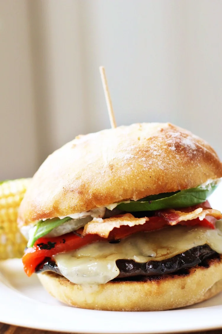 Grilled portobellos with bacon, Swiss, roasted red pepper, and garlic mayo