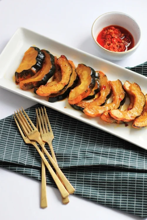 Roasted acorn squash with brown sugar and chili oil