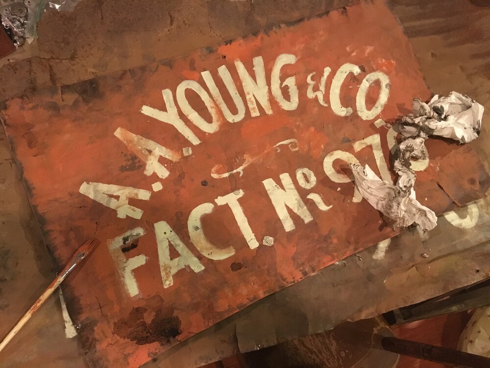 colonial american sign company_custom paint on sheet metal sign_young.jpeg