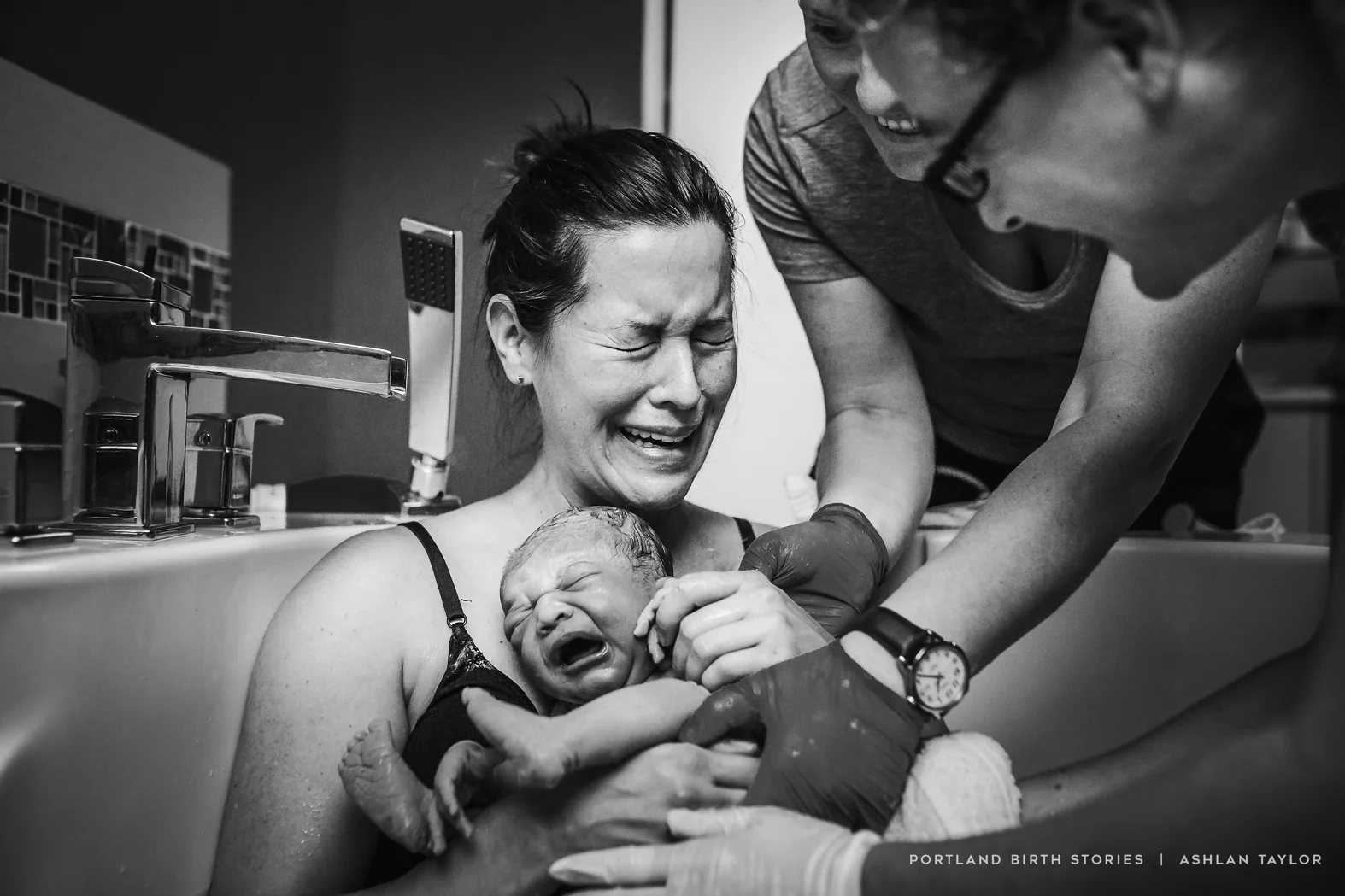 Water Birth delivery at birth center with midwives