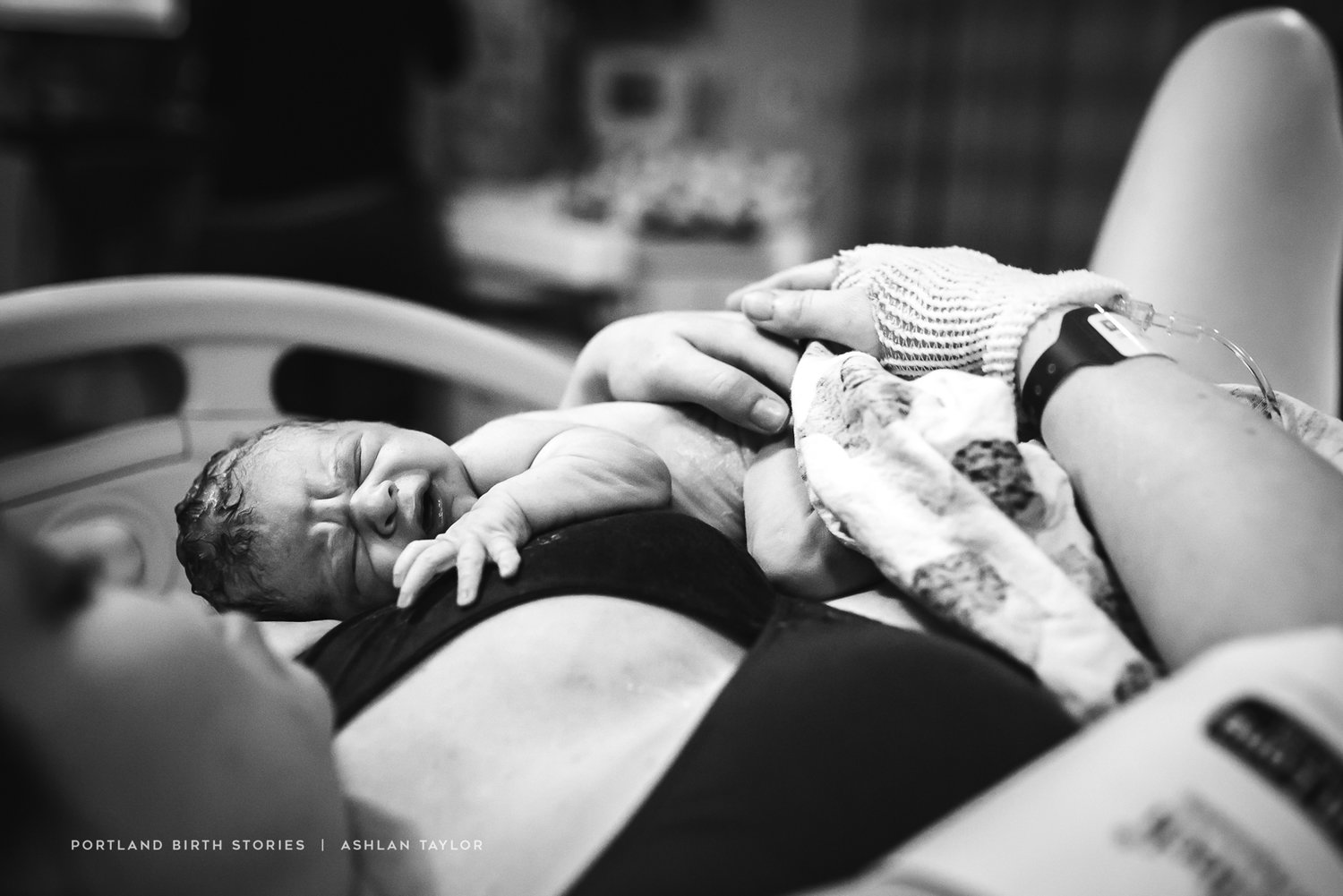 Newborn baby delivered into Mothers arms at hospital birth