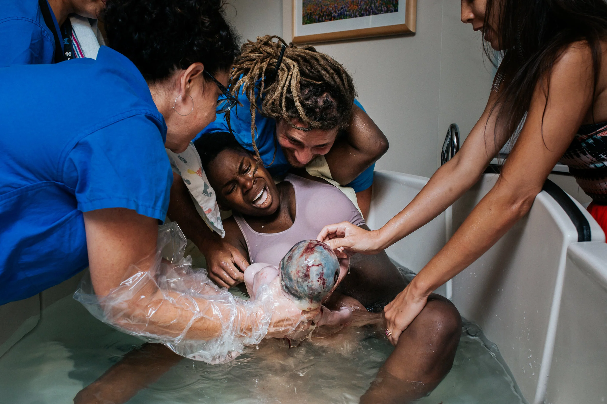 Hospital water birth of en-caul baby