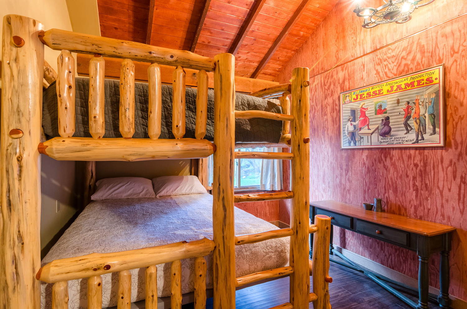 Double Bed on top, Queen on bottom. Sleeps 4
