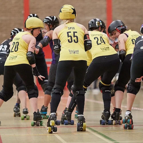 Spin Diesel on the jam line while our blockers are ready for the Hereford jammer; photo courtesy of Roller Derby on Film .
