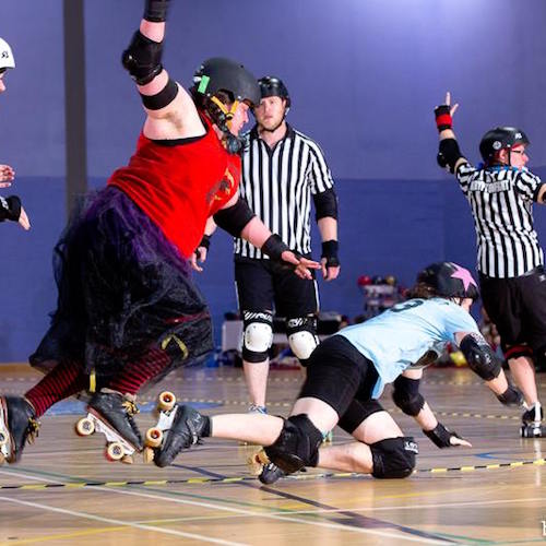 Fever showing Postlewaight her magical flying smashy roller derby powers; photo courtesy of Dave McAleavy boutday.com .