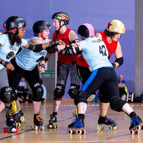 Monifa, Belle & Lawless holding back Hadrian's Brawl; photo courtesy of Dave McAleavy boutday.com .