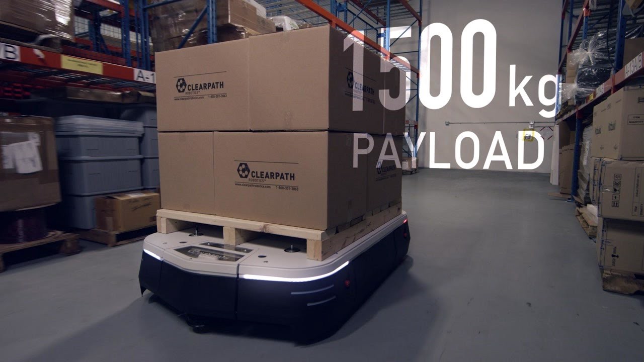 An OTTO 1500 robot autonomously navigates around a warehouse.