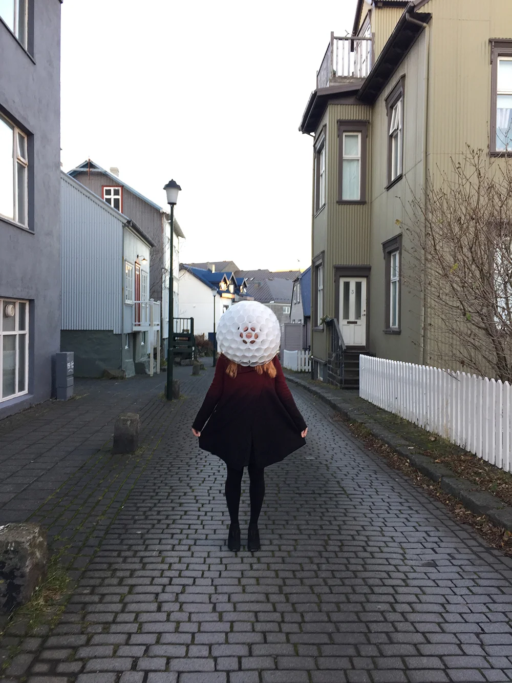 Golf Ball Girl strutting her stuff down the street thanks to a clever costume and complete anonymity. &nbsp;