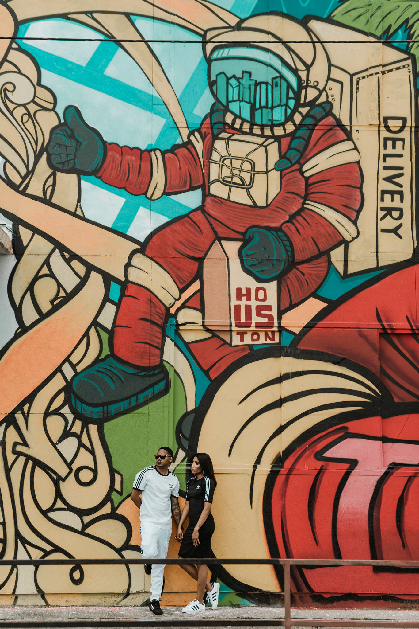 houston-graffiti-wall-astronaut-space-colorful-art-urban-black-couple-engagement-photography