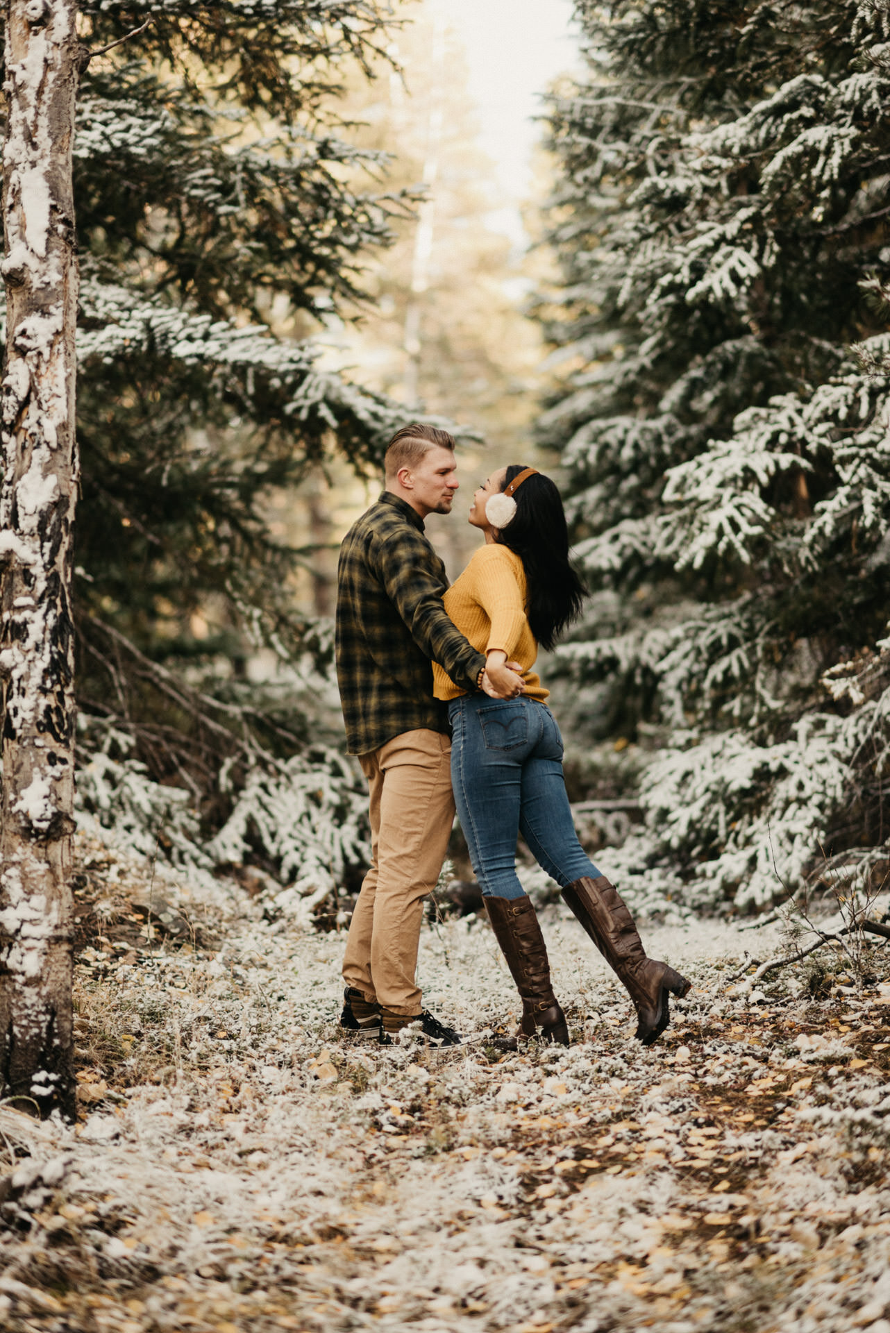 kelsey-rob-snowy-fall-leaves-evergreen-colorado-engagement-session-18.jpg