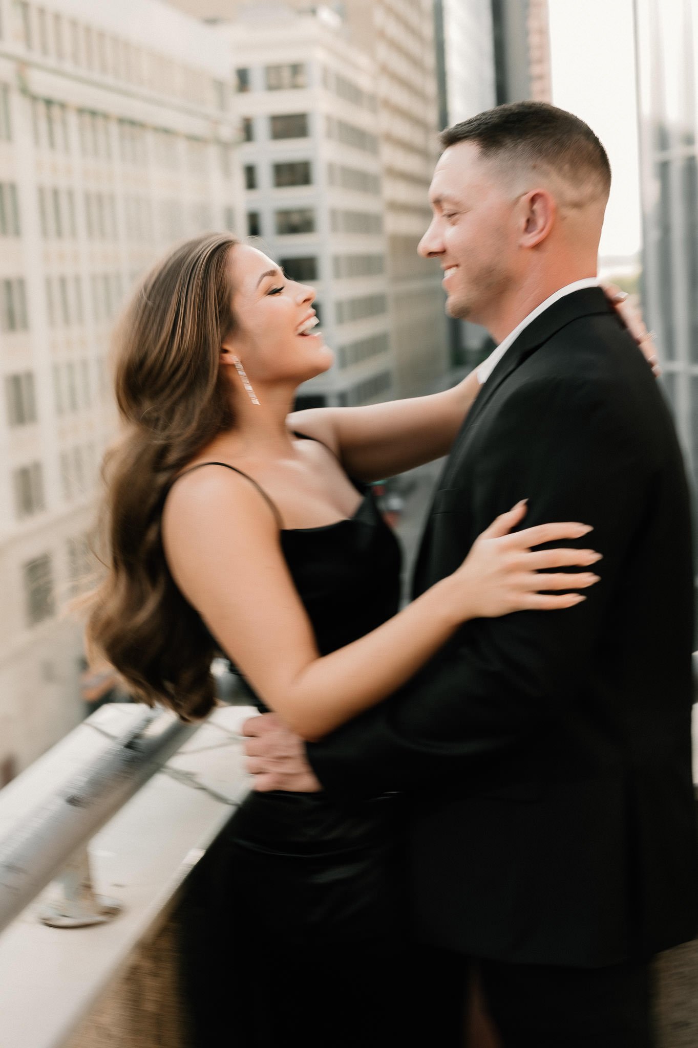 carrah-josh-modern-classy-downtown-houston-rooftop-engagement-session-sm-13.jpg