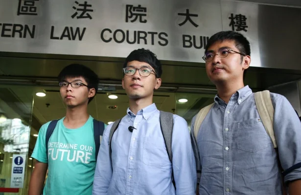 Left to right: Joshua Wong, Nathan Law and Alex Chow, outside Eastern Court in August 2016. Photo: Sam Tsang/SCMP