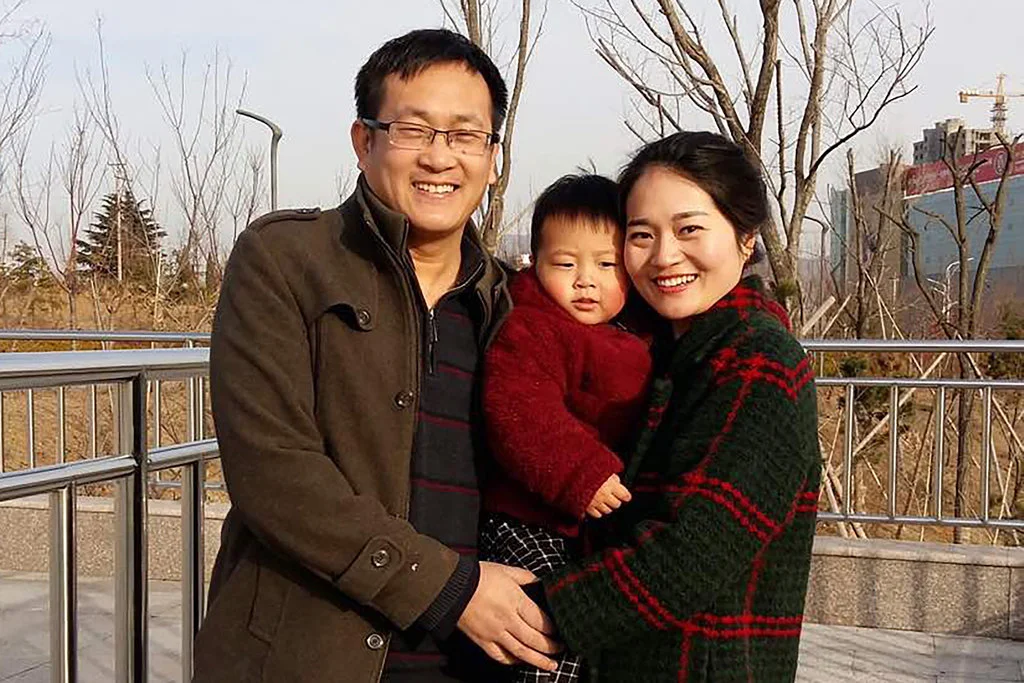 Wang Quanzhang and his wife Li Wenzu, with their child. Credit: Li Wenzu, via Associated Press