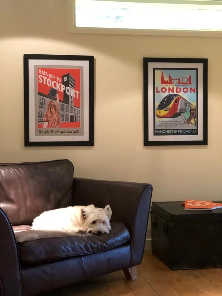 Teddy the dog and my posters at Hatters Promotions in Stockport