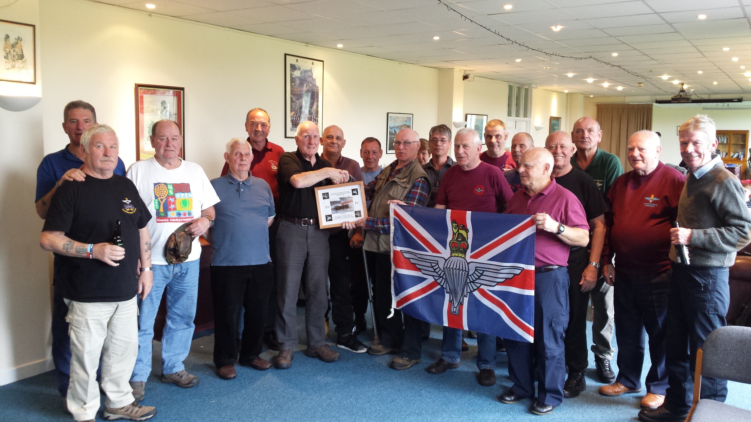  EAST meets WEST - Lothian Branch chairman - Davie Adams and members of his branch being presented with a "KIEL CANAL" framed photo of the disaster by Chairman of Glasgow and West of Scotland Branch chairman - Frank Cameron assisted with his branch m