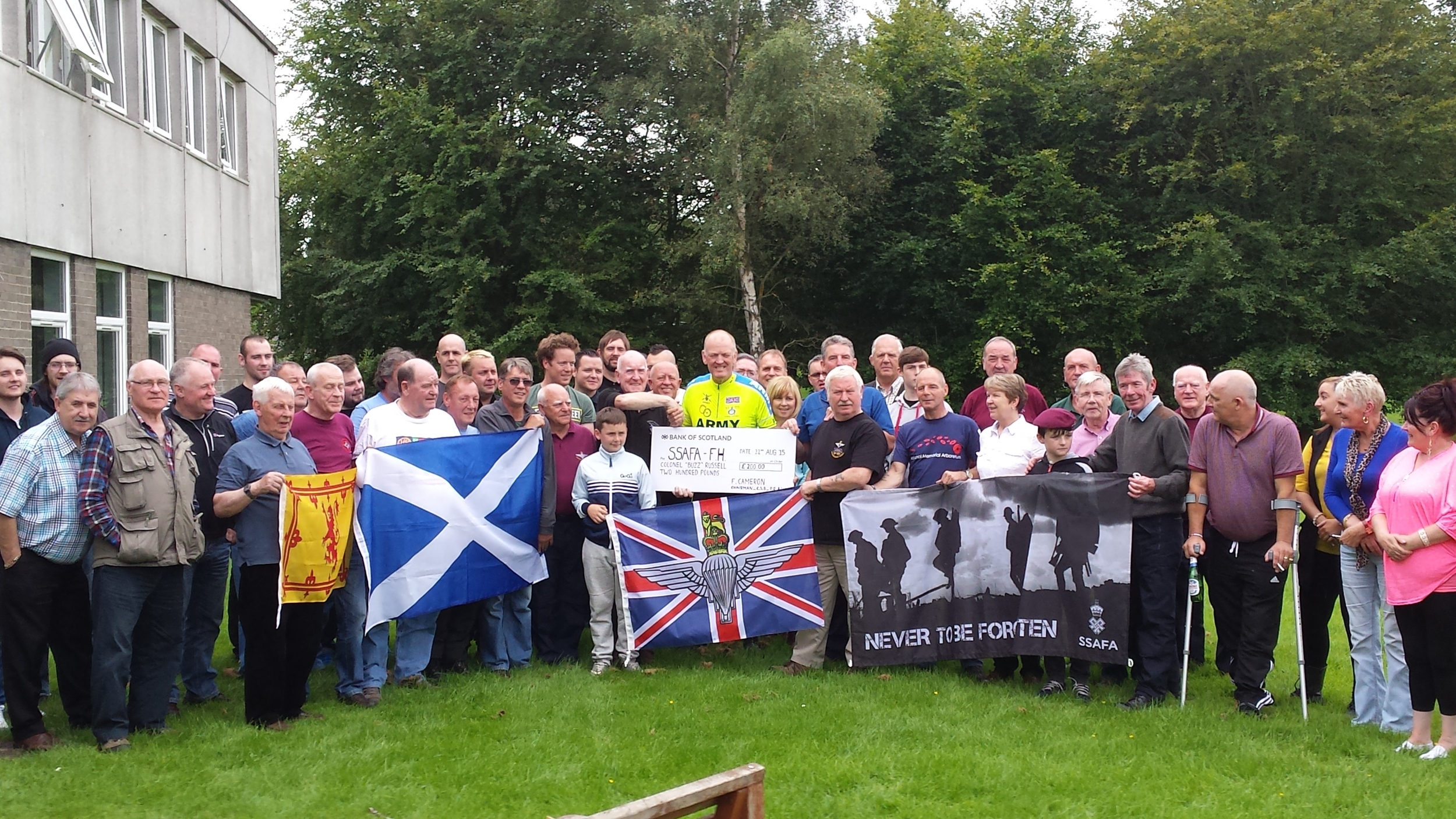  Glasgow and West of Scotland Branch chairman - Frank Cameron presenting Colonel "BUZZ" Russel with a cheque for £200 