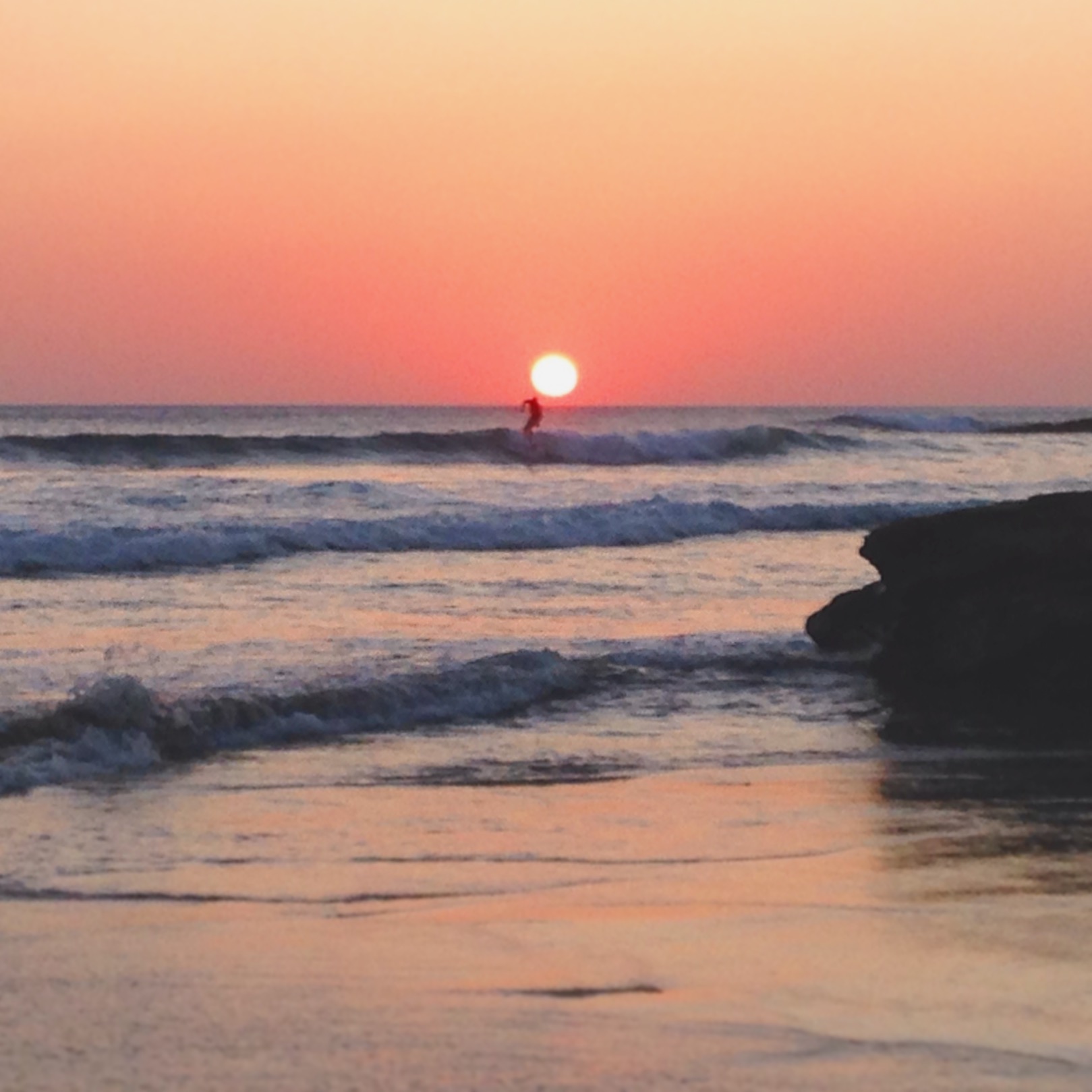 Sunset and small swell in Playa Maderas, Nicaragua
