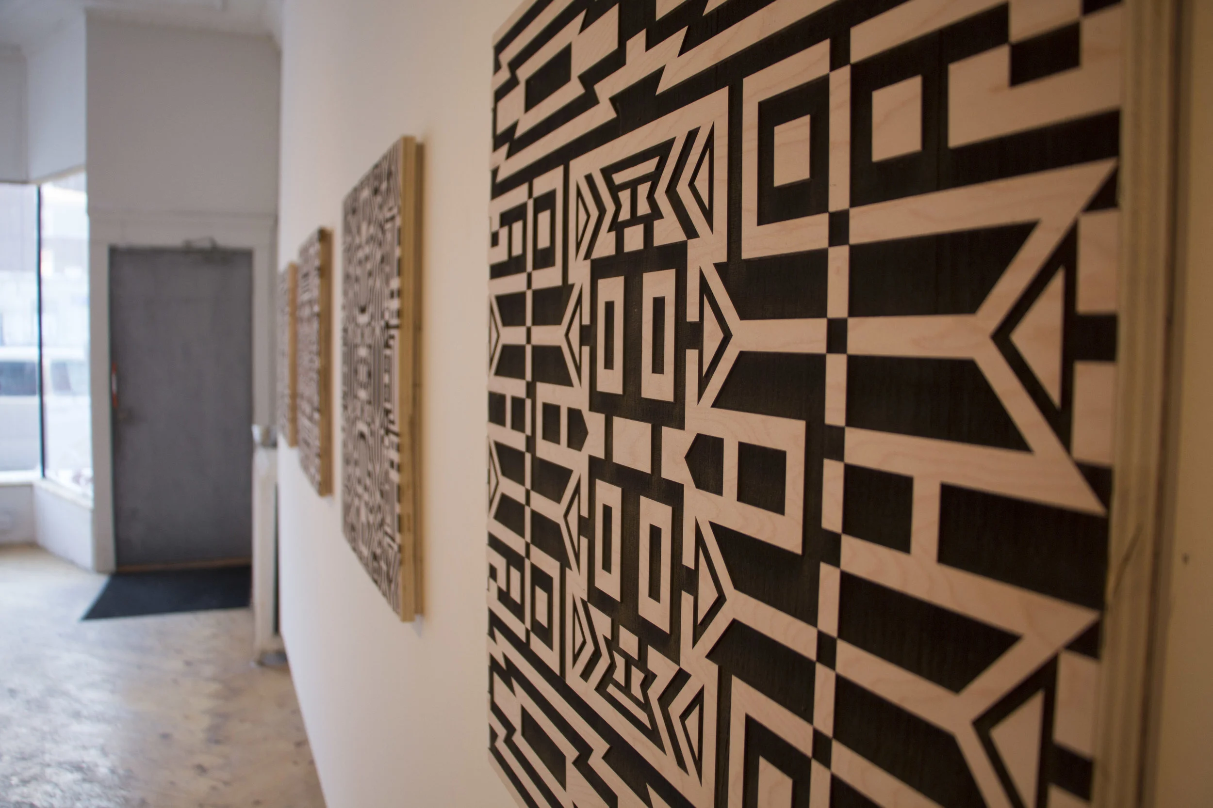 June 08 (installation view) 24 x 24 in. Laser-etched wood, 2017