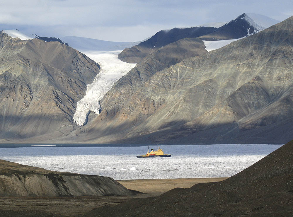 The icebreaker looks like a toy in the cast landscape of Tanquary Fiord, Ellesmere island.