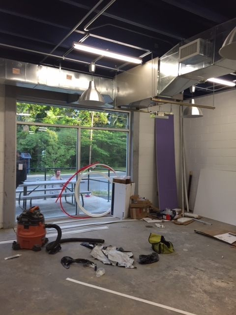 This awkward window space made for the perfect spot for a custom 12' spanning bar.