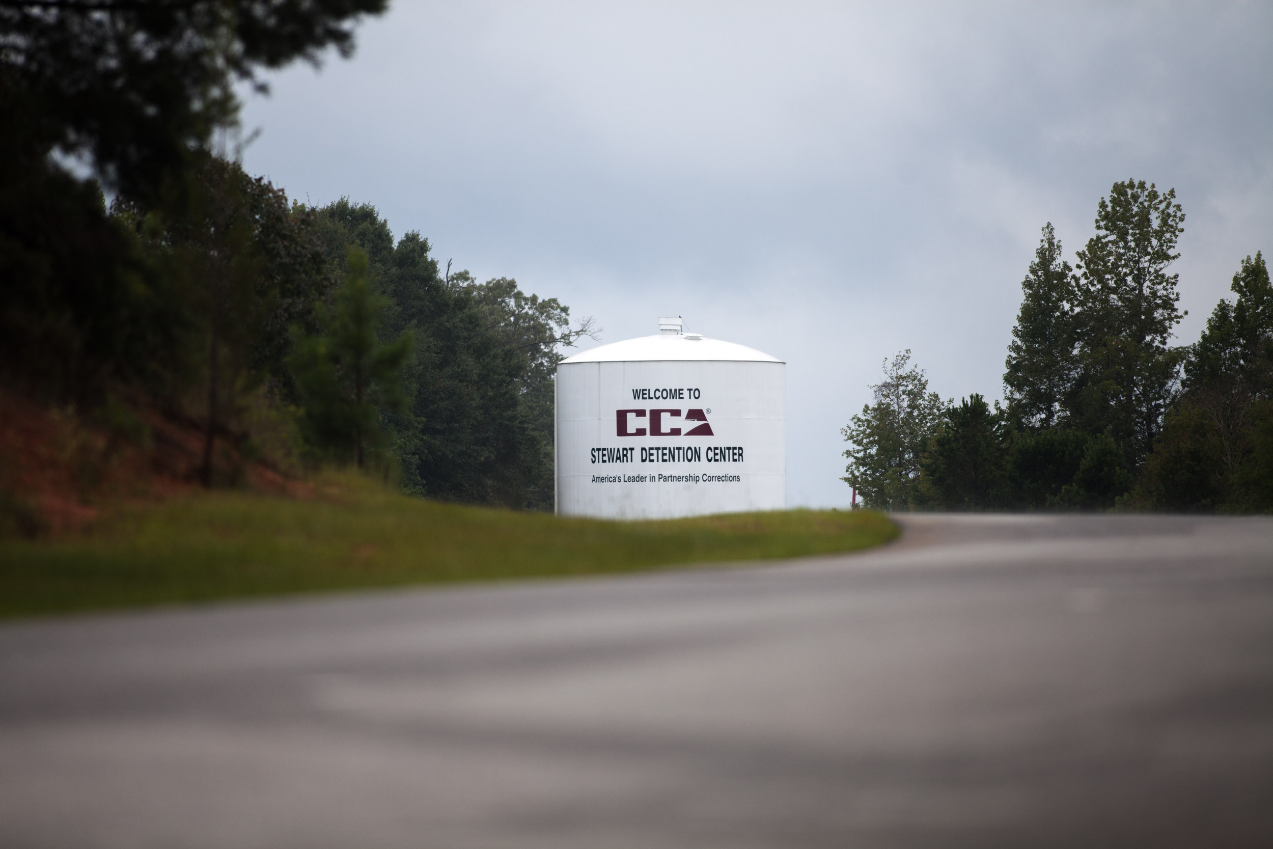 A tower marks the entrance to Stewart Detention Center in Lumpkin, Ga.