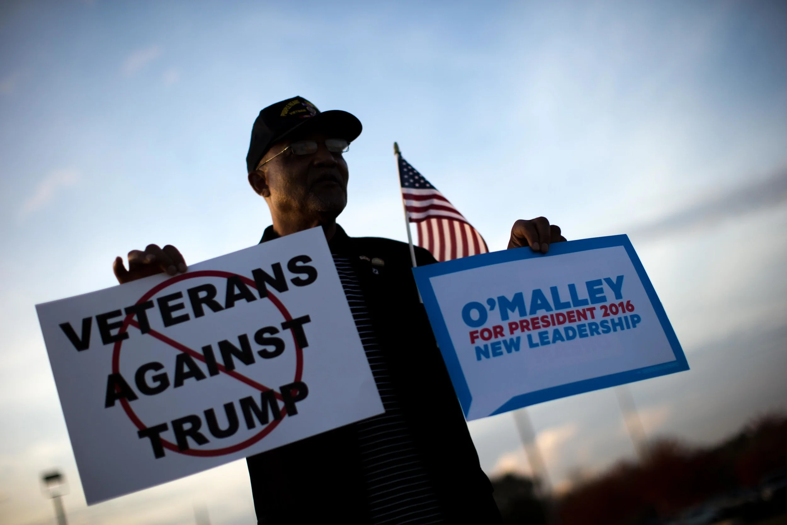 Former Macon Mayor C. Jack Ellis protests outside of the Macon Centreplex in Macon, Ga. where Republican presidential candidate Donald Trump is set to hold a campaign rally. (Ap Photo/Branden Camp)