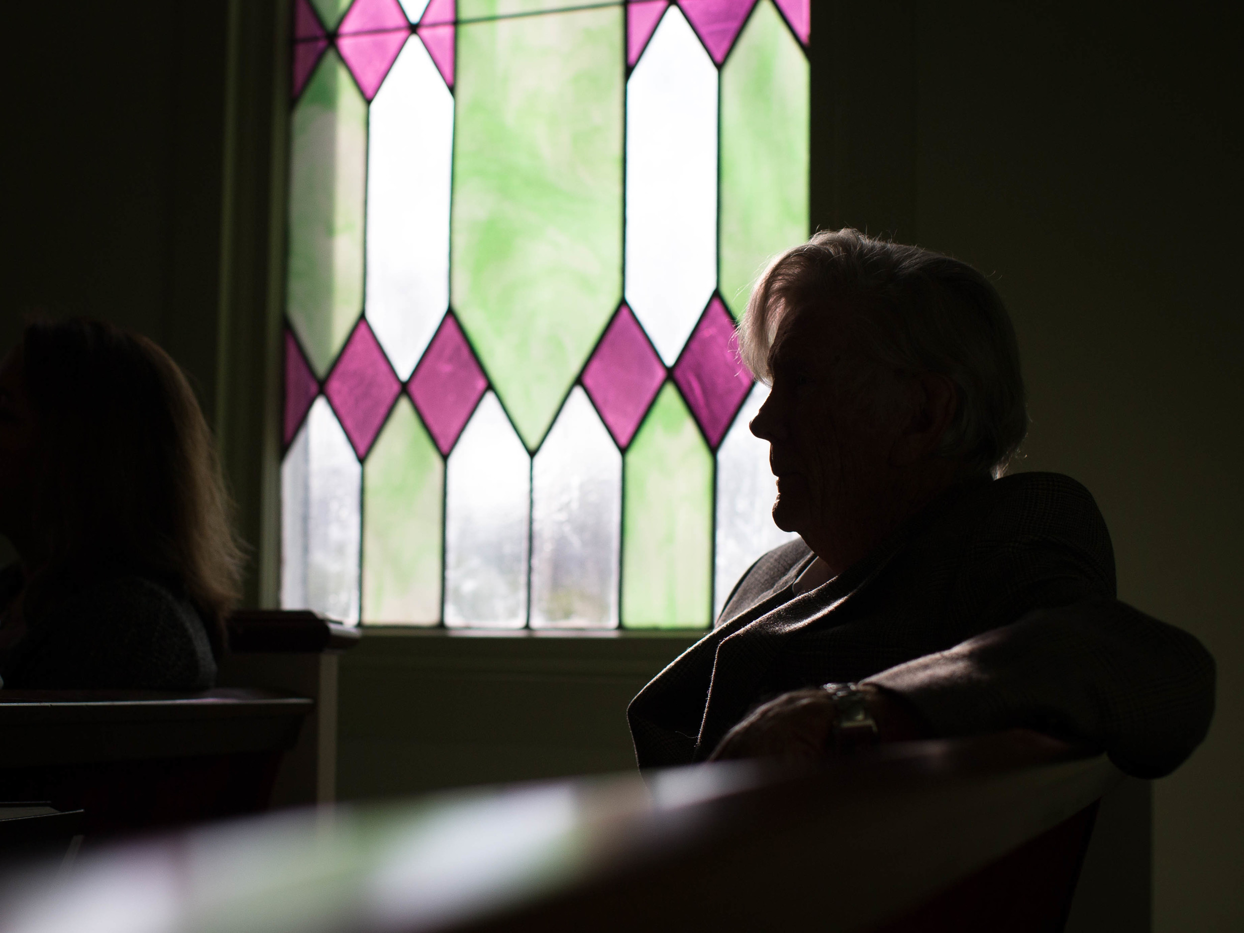 Church member Warren Chancey listens as former President Jimmy Carter teaches during Sunday School class at Maranatha Baptist Church in his hometown, Sunday, Dec. 13, 2015, in Plains, Ga. A recent MRI showing no cancer on Jimmy Carter's brain is "very positive" news for the former president but will not end his medical treatment, doctors said. Carter, 91, announced on Dec. 6 that doctors found no evidence of the four lesions discovered on his brain this summer and no signs of new cancer growth. (AP Photo/Branden Camp)