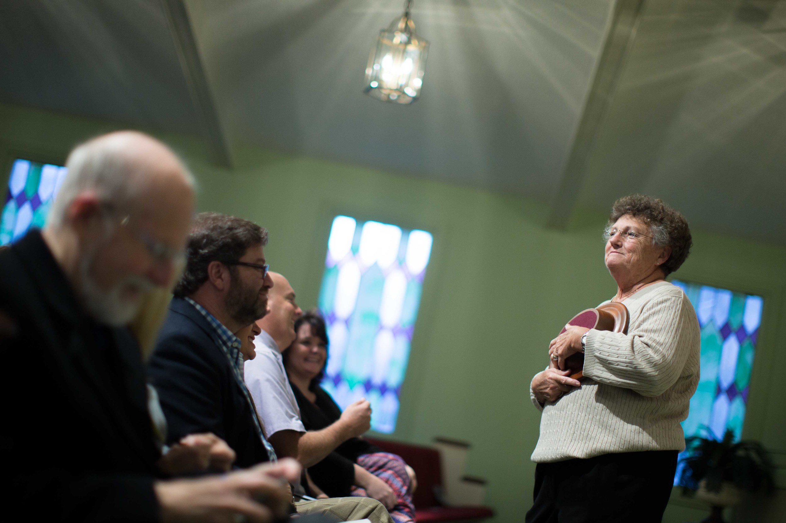 Jan Williams shows guests an offering plate that former President Jimmy Carter made before he teaches Sunday School class at Maranatha Baptist Church in his hometown, Sunday, Dec. 13, 2015, in Plains, Ga. A recent MRI showing no cancer on Jimmy Carter's brain is "very positive" news for the former president but will not end his medical treatment, doctors said. Carter, 91, announced on Dec. 6 that doctors found no evidence of the four lesions discovered on his brain this summer and no signs of new cancer growth. (AP Photo/Branden Camp)