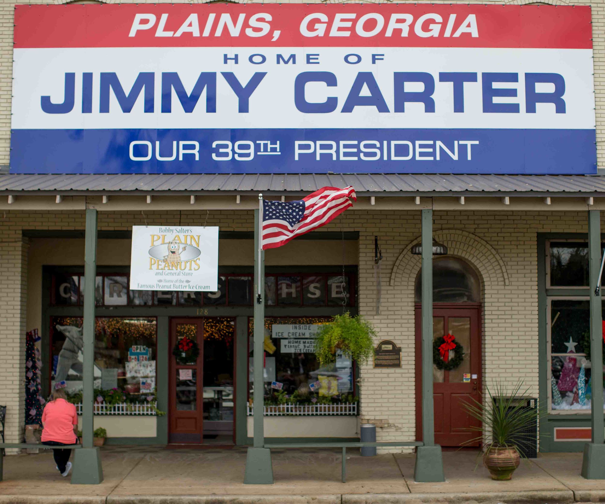 A view of downtown Plains, Ga., Sunday, Dec. 13, 2015. A recent MRI showing no cancer on Jimmy Carter's brain is "very positive" news for the former president but will not end his medical treatment, doctors said. Carter, 91, announced Dec. 6 that doctors found no evidence of the four lesions discovered on his brain this summer and no signs of new cancer growth. (AP Photo/Branden Camp)