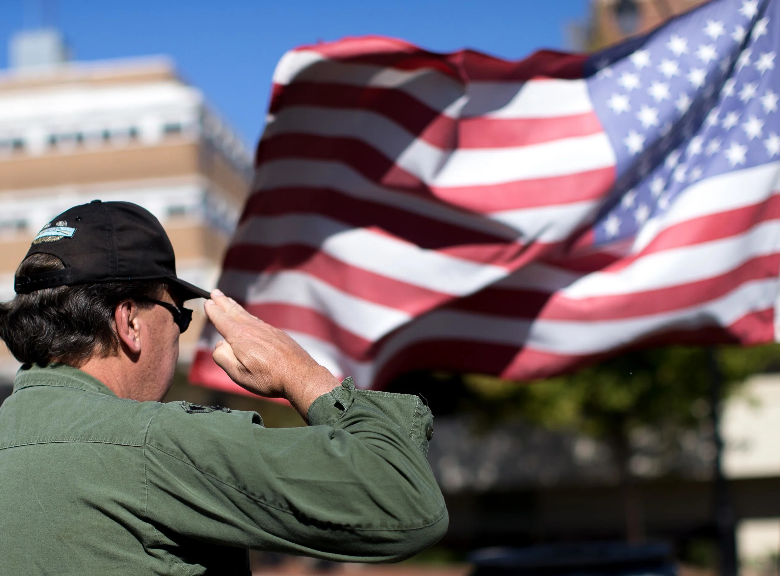 Nov. 11, 2015 - Marietta, Ga, U.S - DAVID THOMAS, a Vietnam War Army veteran, salutes during a parade on Veterans Day. Thomas deployed to Vietnam from 1970-71. (Credit Image: © Branden Camp via ZUMA Wire)
