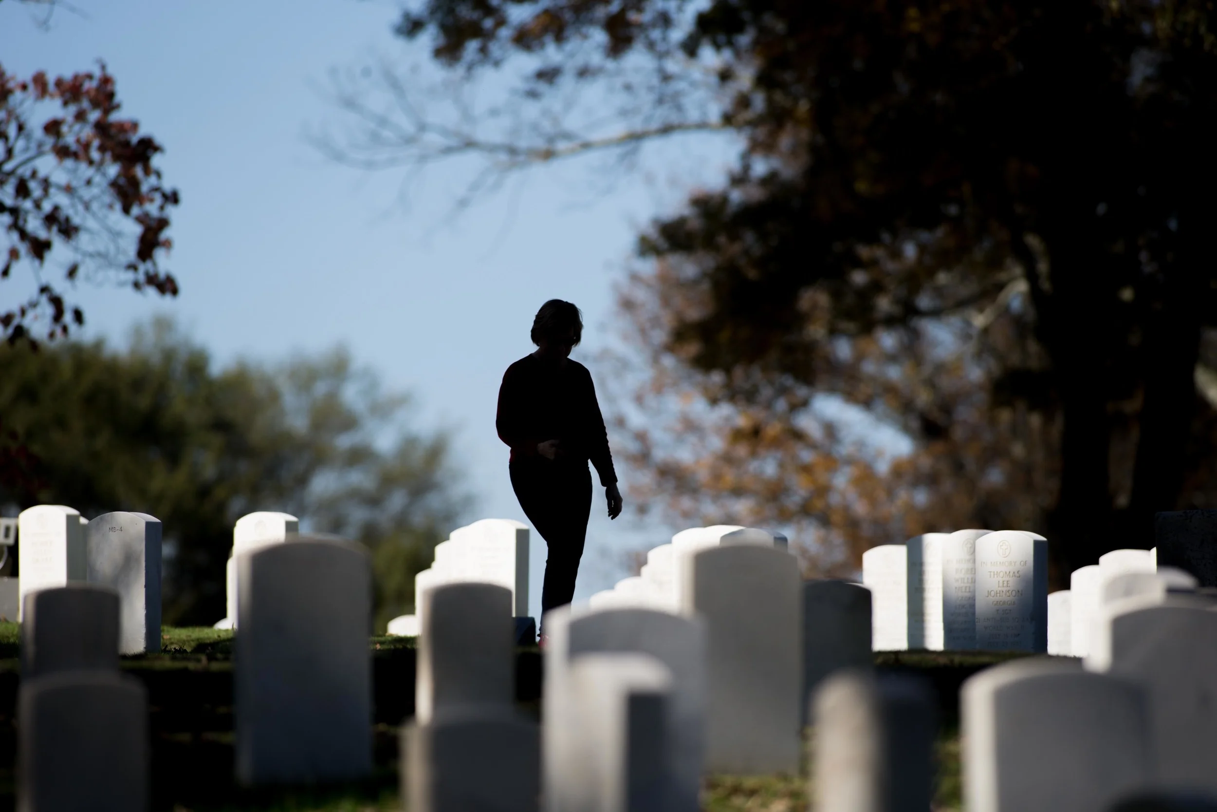 Nov. 11, 2015 - Marietta, Ga, U.S - A woman walks through Marietta National Cemetery on Veterans Day. (Credit Image: © Branden Camp via ZUMA Wire)