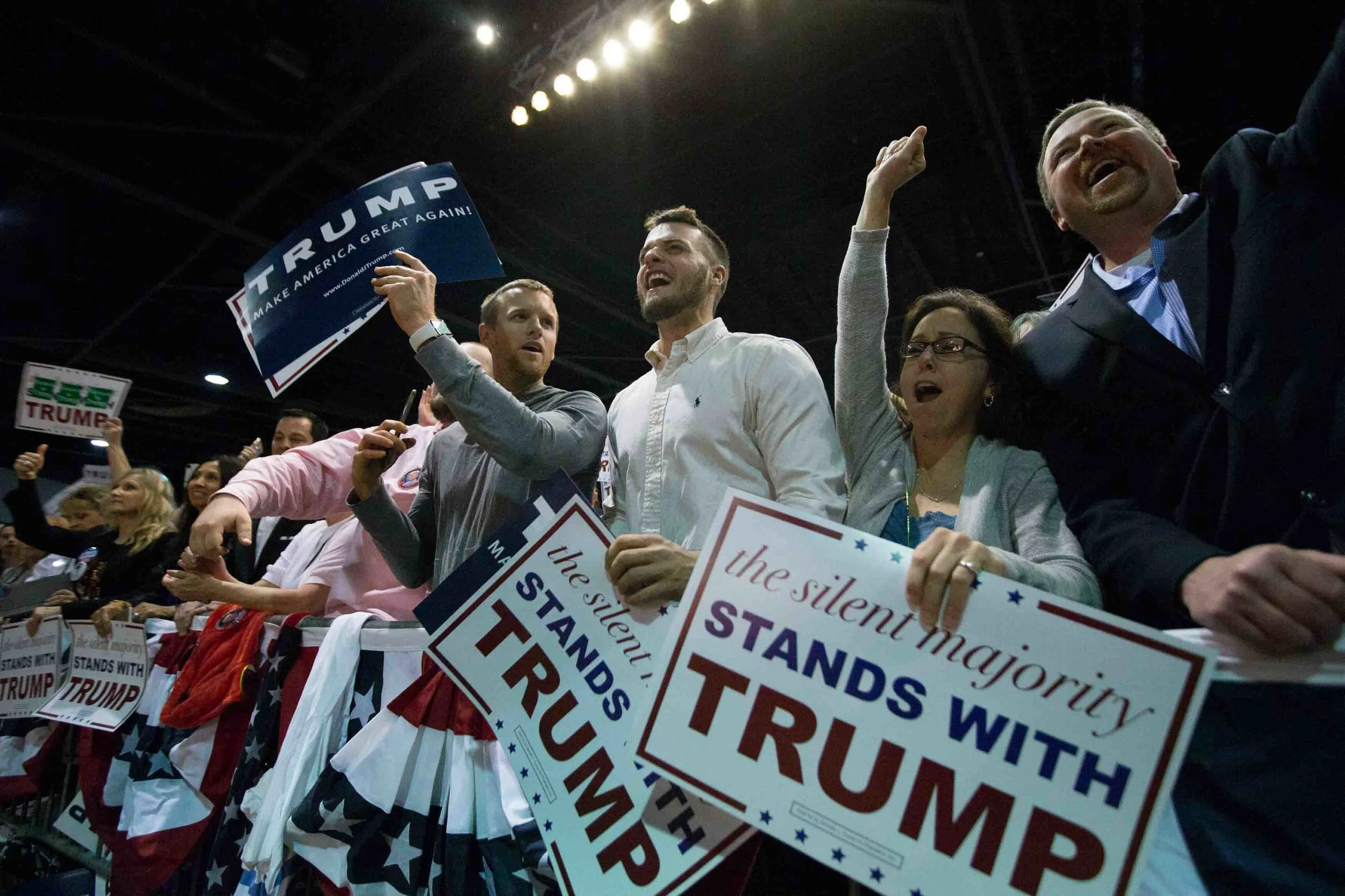 People cheer as Republican presidential candidate Donald Trump speaks during a campaign rally at the Georgia World Congress Center, February 21, 2016 in Atlanta, Georgia. Trump won the South Carolina Republican primary over nearest rivals Sen. Marco Rubio (R-FL) and Sen. Ted Cruz (R-TX). Branden Camp/Getty Images