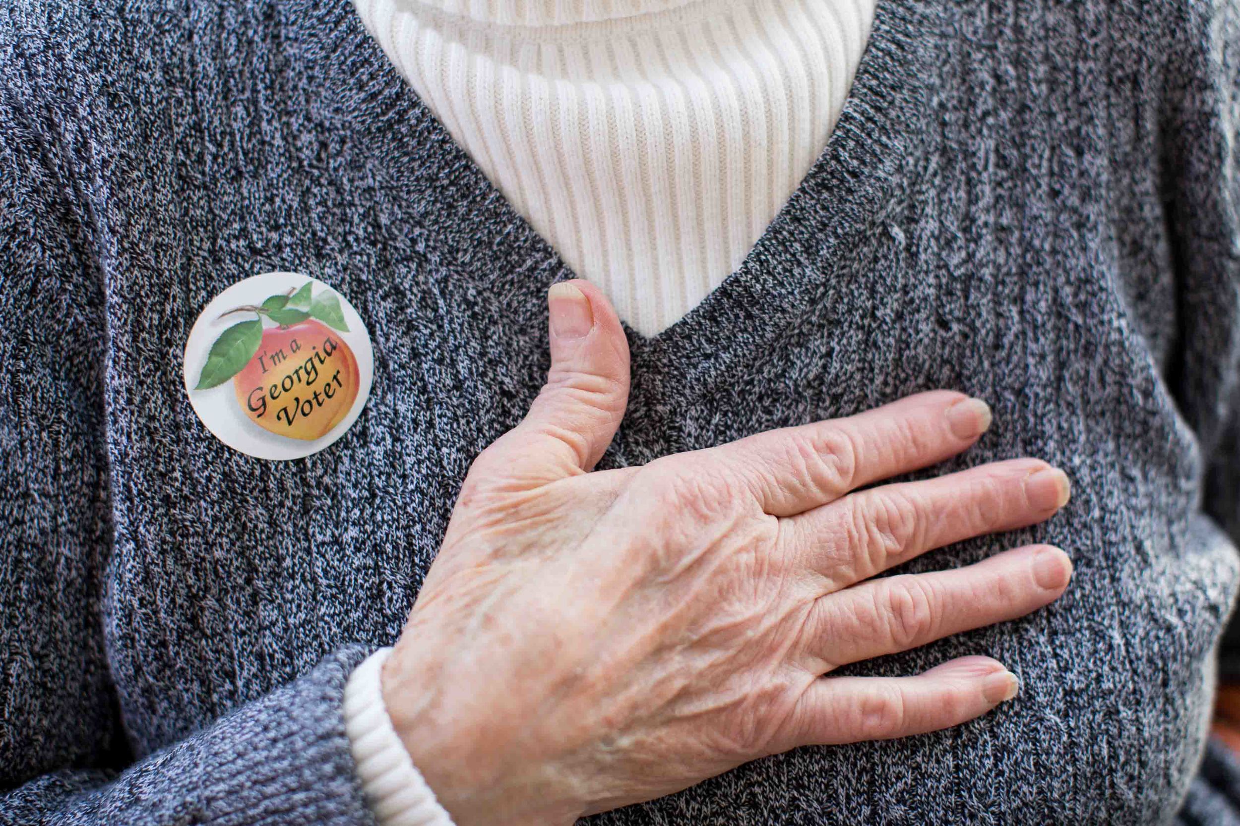 TAYLORSVILLE, GA - MARCH 1, 2016: Edna Martinez wears a "I'm a Georgia Voter" sticker after casting her ballot at Taylorsville Town Hall on Super Tuesday March 1, 2016, in Taylorsville, Georgia. Voters head to the polls to cast their votes on Georgia's presidential primary. (Photo by Branden Camp/Getty Images)
