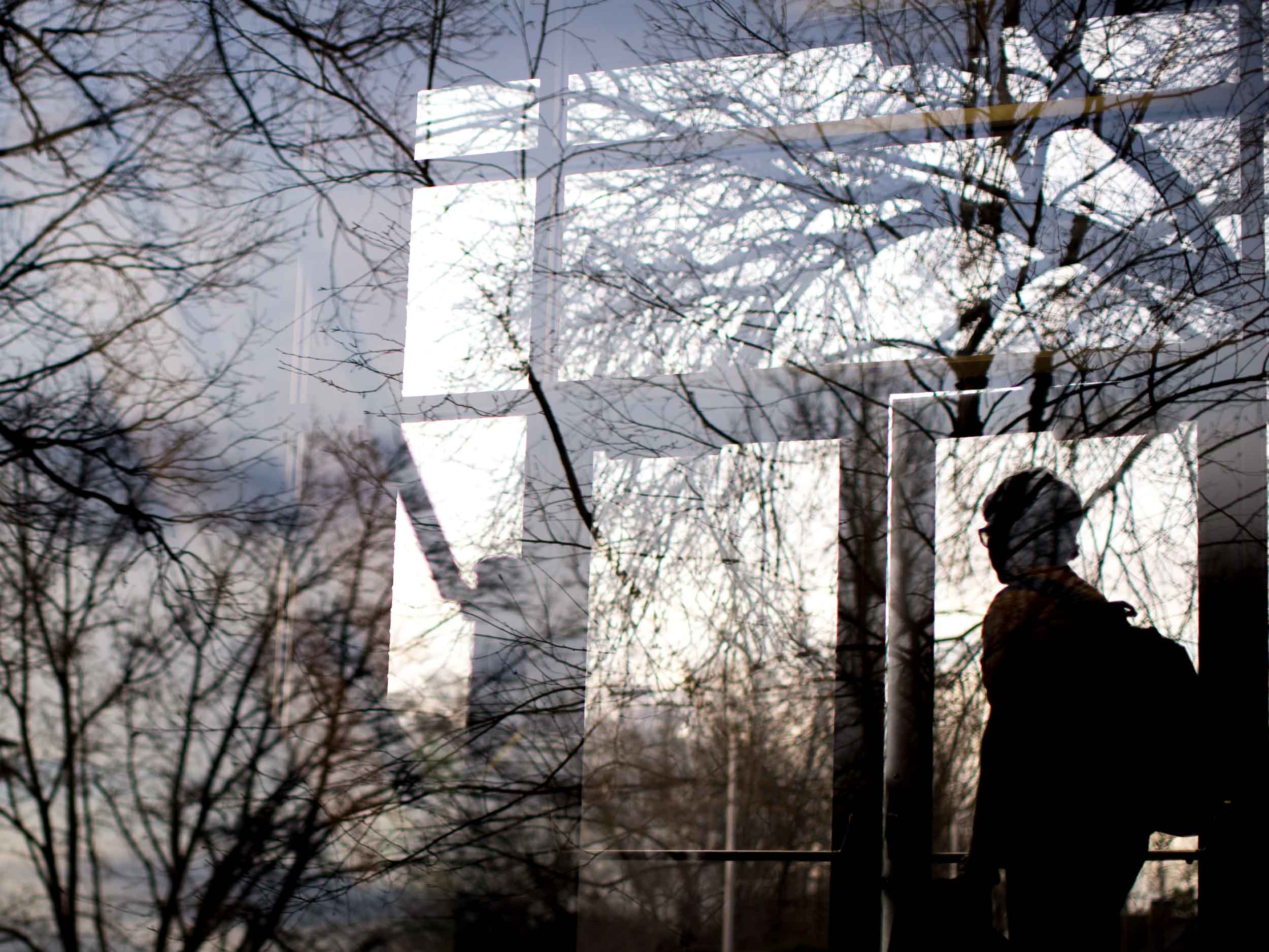  A Kennesaw State University exits a building on campus on warm day, Thursday, March 10, 2016, in Kennesaw, Ga.