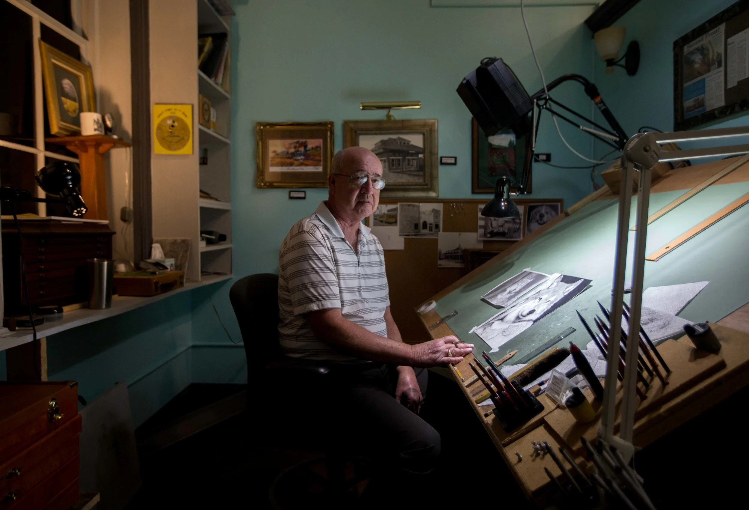Artist Skip McNutt poses for a portrait at his studio in historic downtown Adairsville, Ga. McNutt is hoping to use his art to bring business to small towns in Northwest Georgia. If you visit historic downtown Adairsville, a mural that McNutt and a colleague painted depicting the great locomotive chase is displayed on the old train depot.