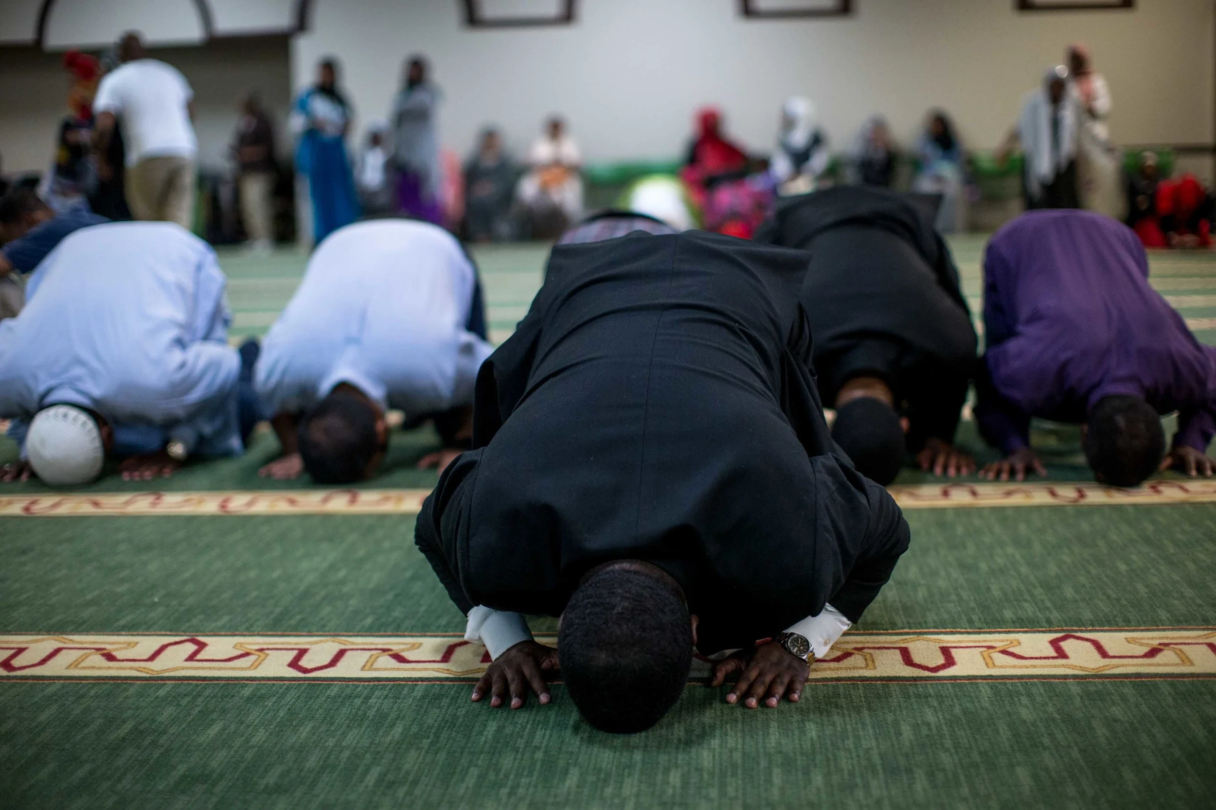 June 9, 2016 - Atlanta, Ga, U.S - Muslim men pray before an interfaith service at the Atlanta Masjid of Al Islam mosque in Atlanta. People gathered to honor the late Muhammad Ali, who died on June, 3, 2016, in Phoenix, Arizona.