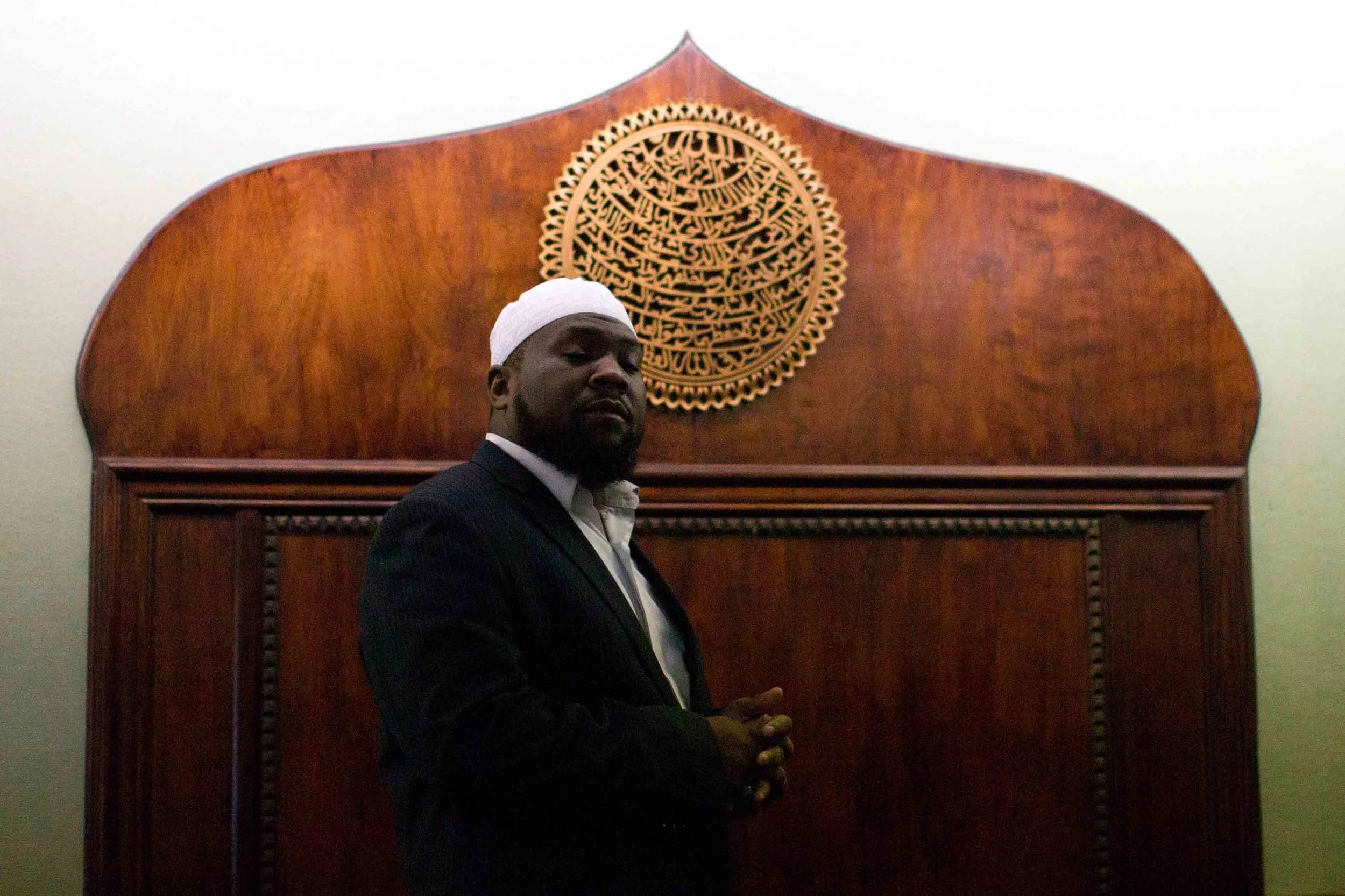 June 9, 2016 - Atlanta, Ga, U.S - Imam Suleimaan Hamed closes his eyes during prayer during an interfaith service at the Atlanta Masjid of Al Islam mosque in Atlanta. People gathered to honor the late Muhammad Ali, who died on June, 3, 2016, in Phoenix, Arizona.