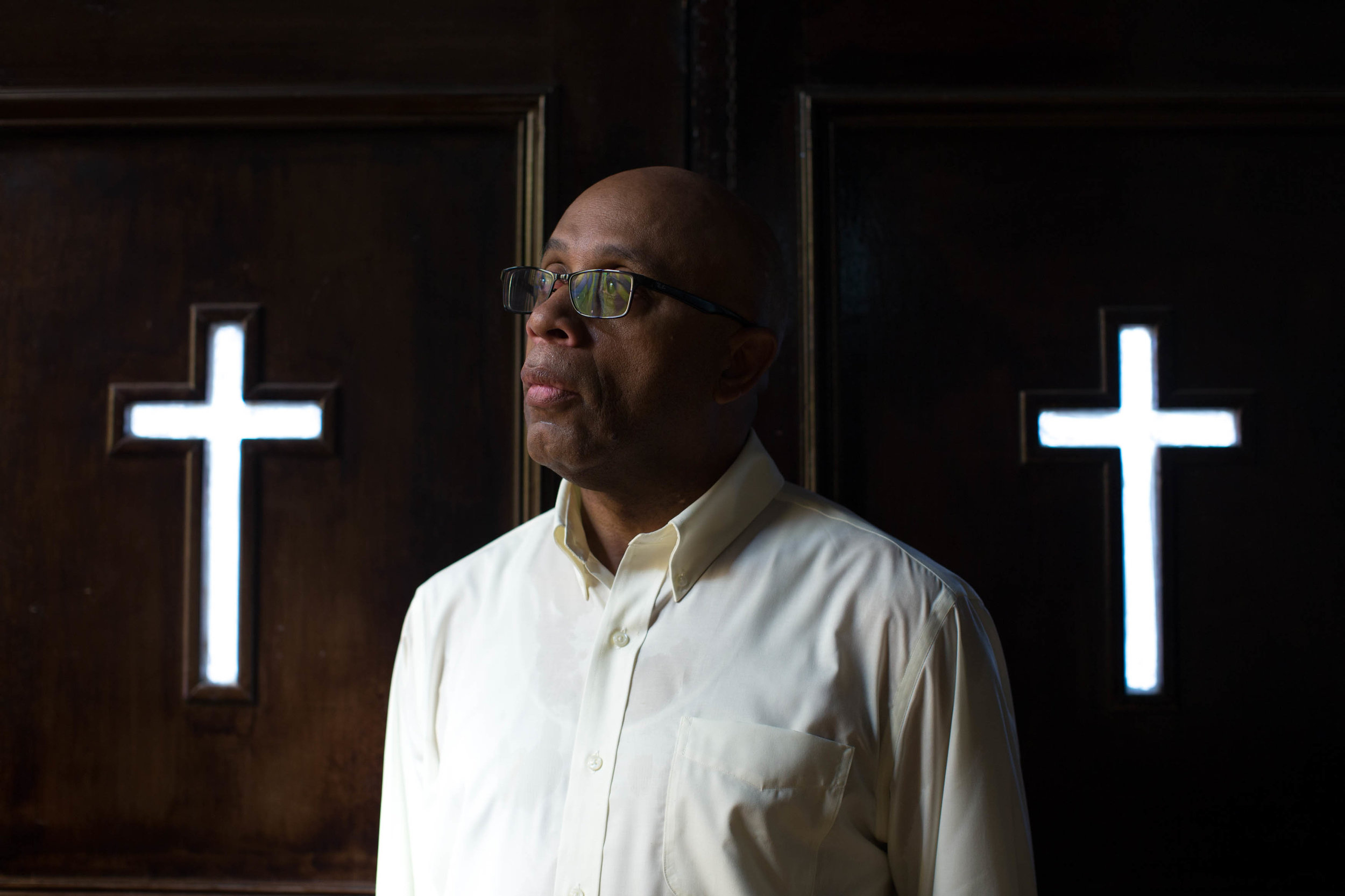The Rev. James W. Goolsby, Jr. poses for a portrait at the First Baptist Church, a predominantly African-American congregation, in Macon, Ga., on Monday, July 11, 2016. The 59-year-old Atlanta native and graduate of Morehouse College and Mercer’s McAfee School of Theology, has been the pastor here for more than 12 years. He said he and a previous pastor at the white church tried to build ties between the congregations but the effort didn’t go very far. This time is different, he said, in part because of his relationship with the new pastor, Scott Dickison. (AP Photo/Branden Camp)
