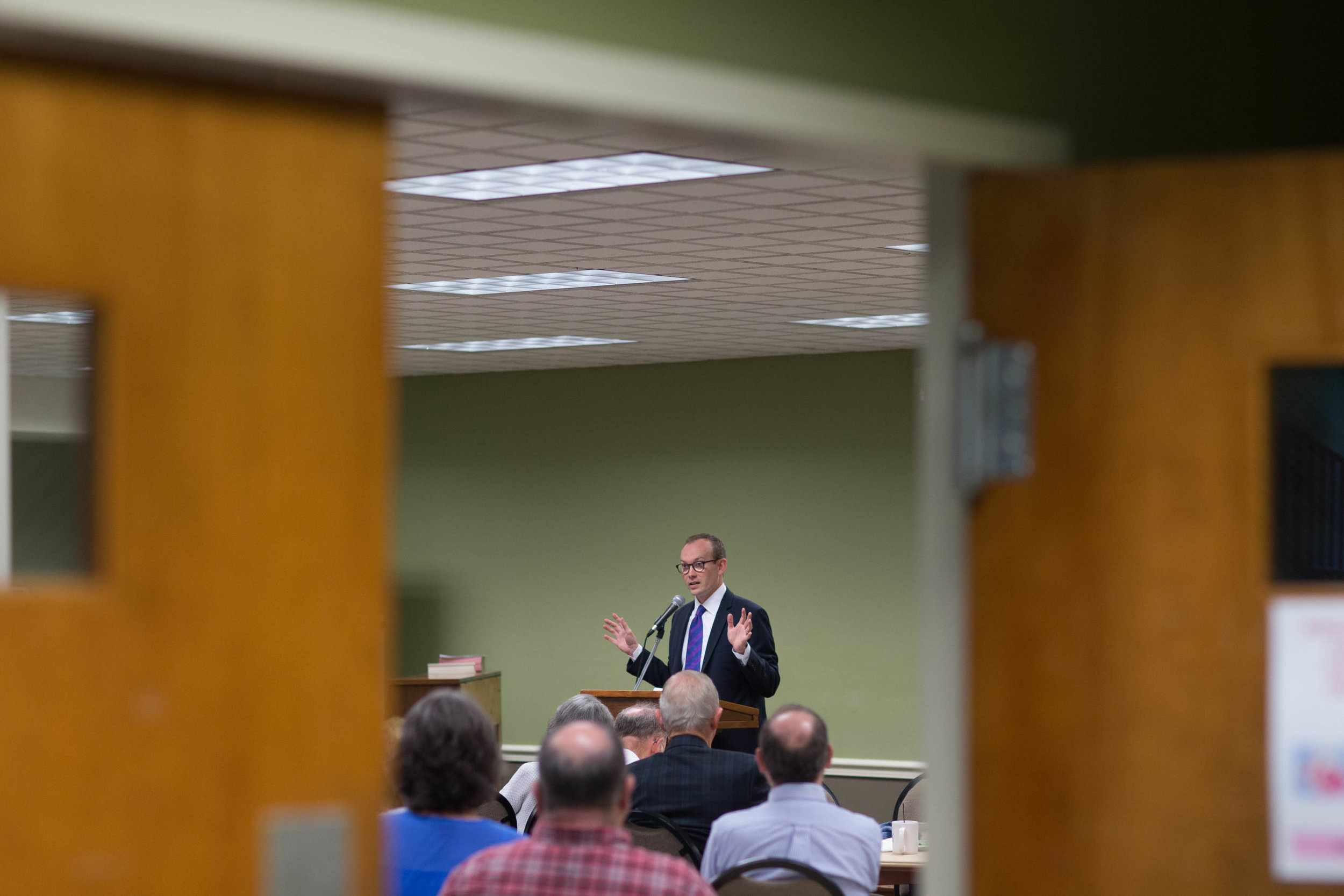 The Rev. Scott Dickison teaches from a book of sermons by Martin Luther King Jr. during a Sunday School class at the First Baptist Church of Christ, a predominantly white congregation, in Macon, Ga., on Sunday, July 10, 2016 - days after the fatal police shootings of Alton Sterling in Louisiana and Philando Castile in Minnesota, and the fatal ambush on Dallas police. "It’s weeks like these when we need more than ever to be with God’s people," Dickison told the roomful of congregants. (AP Photo/Branden Camp)