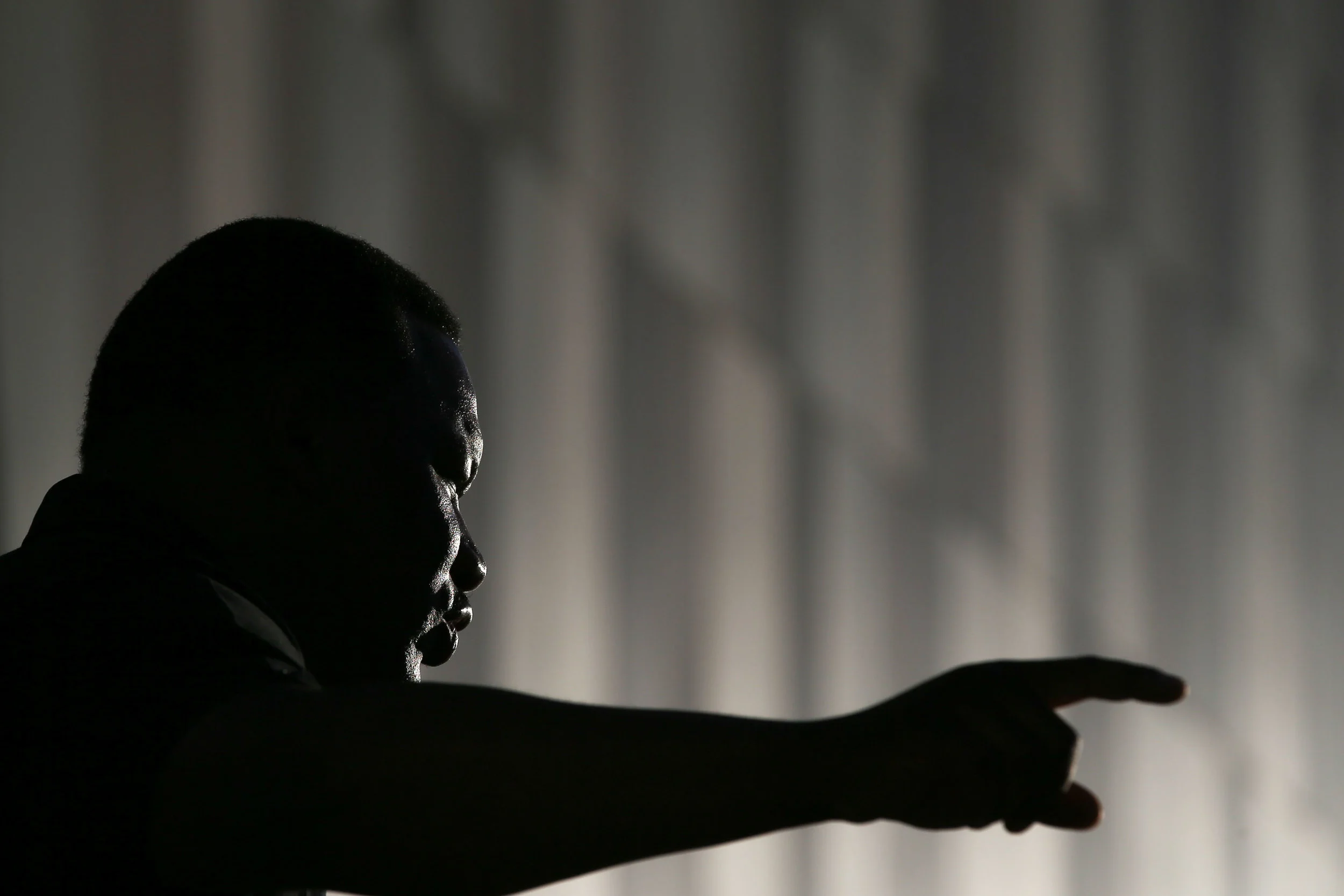 Georgia NAACP president Francys Johnson speaks to a reporter at the Center for Civil and Human Rights before marching with demonstrators through downtown Atlanta, Friday, Sept. 23, 2016 in response to the police shooting deaths of Terence Crutcher in Tulsa, Okla. and Keith Lamont Scott in Charlotte, N.C. (AP Photo/Branden Camp)