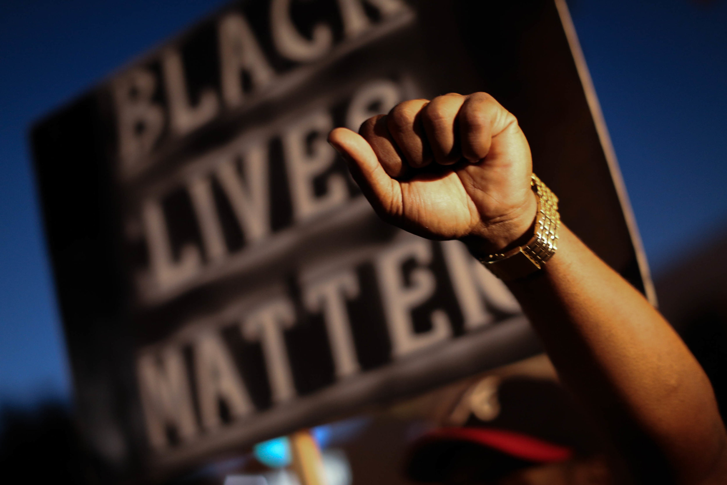 Demonstrators march in Atlanta on Friday, Sept. 23, 2016 in response to the police shooting deaths of Terence Crutcher in Tulsa, Okla. and Keith Lamont Scott in Charlotte, N.C. (AP Photo/Branden Camp)