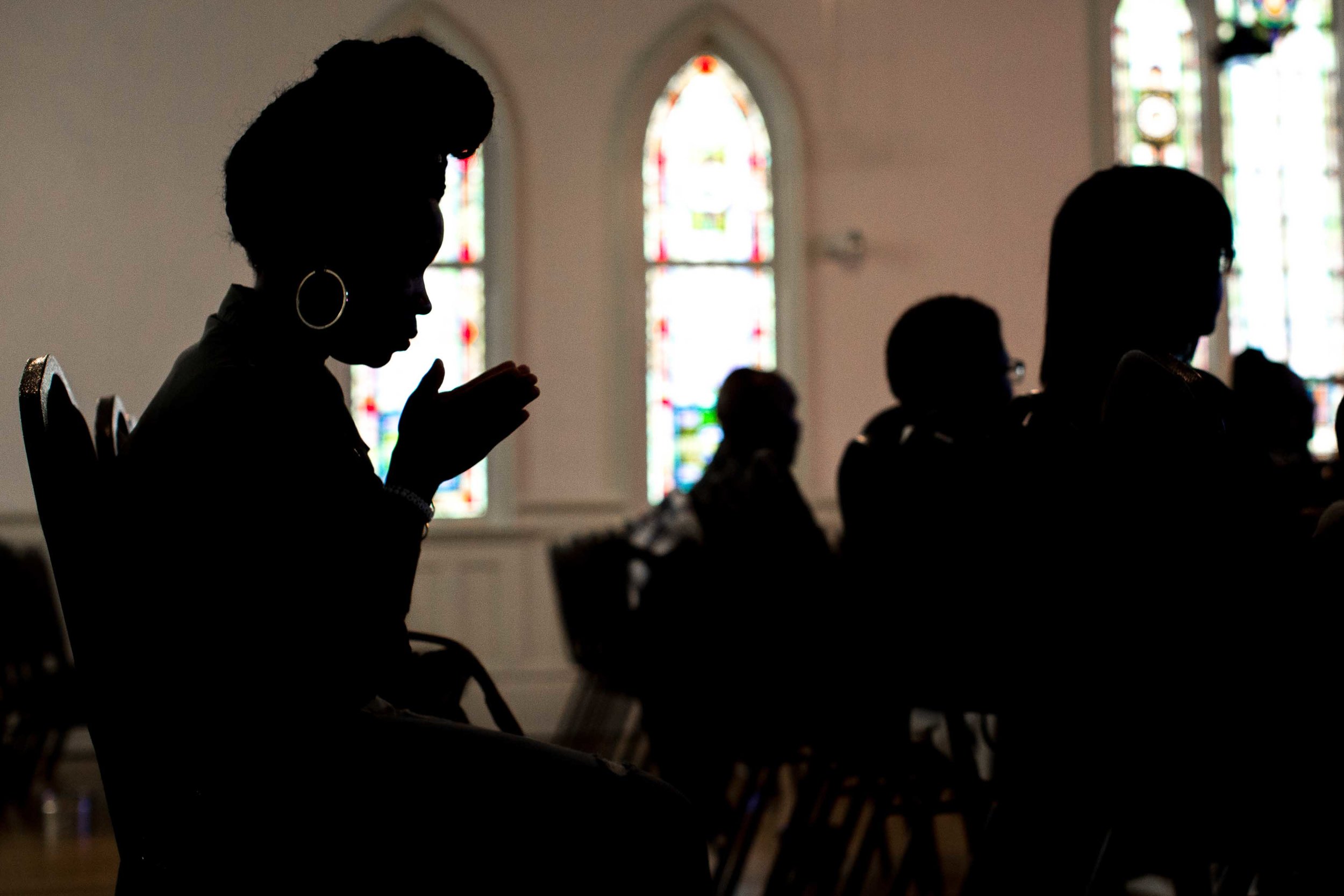A woman prays during a church service at Pulse Church, Sunday, Nov. 13, 2016, in Atlanta. Branden Camp / for NBC News