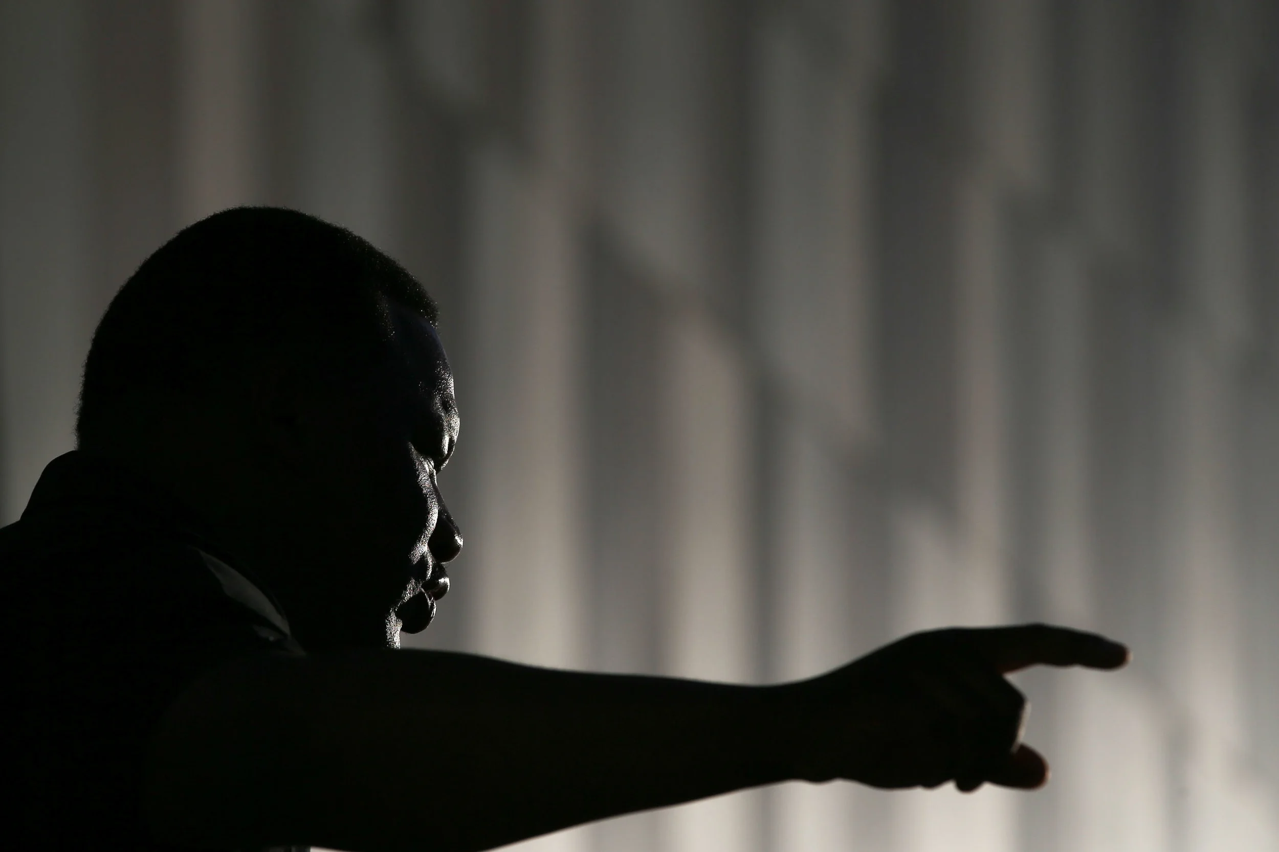 Georgia NAACP president Francys Johnson speaks to a reporter at the Center for Civil and Human Rights before marching with demonstrators through downtown Atlanta, Friday, Sept. 23, 2016 in response to the police shooting deaths of Terence Crutch in Tulsa, Okla. and Keith Lamont Scott in Charlotte, N.C. (AP Photo/Branden Camp)