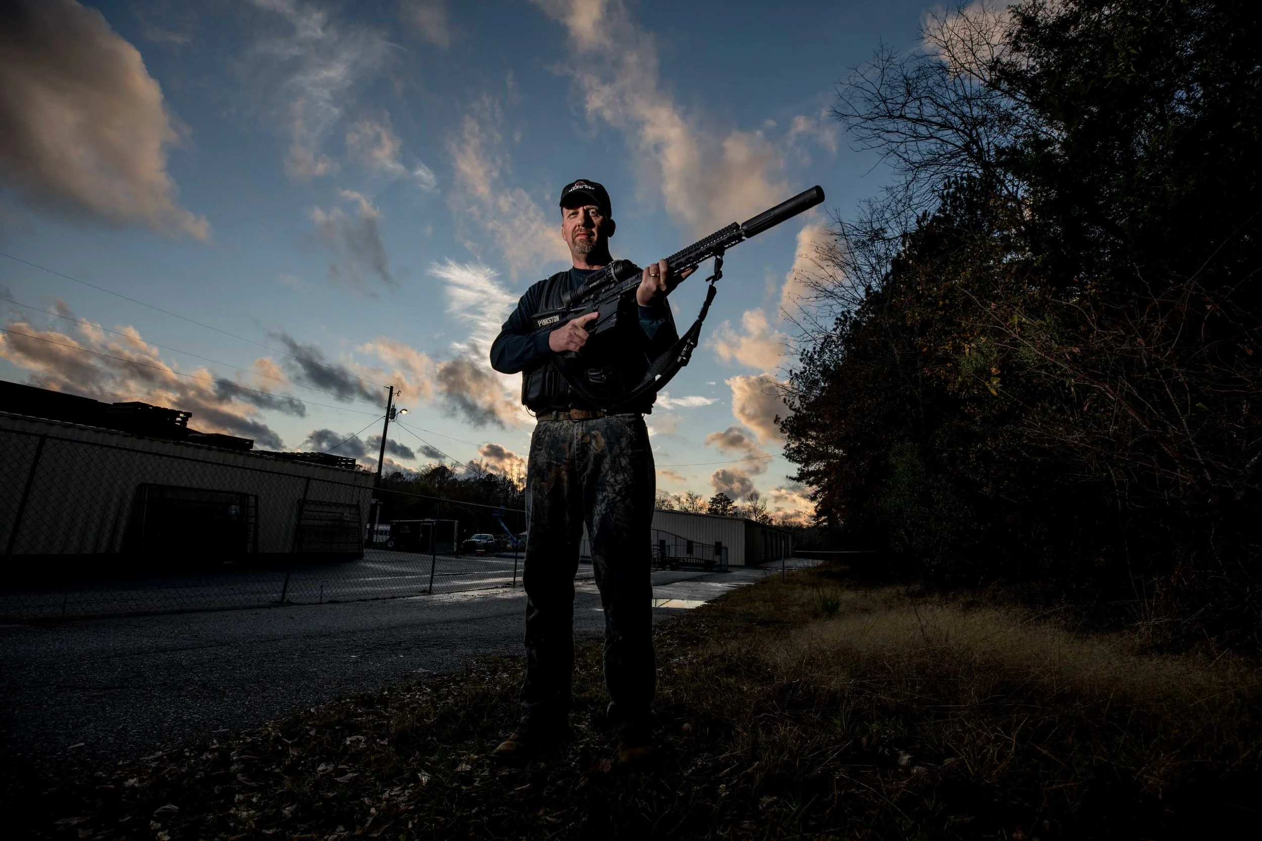 Rod Pinkston, owner of a Georgia hog-control company, and one of his AR-10 rifles, a model that is similar to the AR-15 but allows for heavier ammunition.Branden Camp / for NBC News